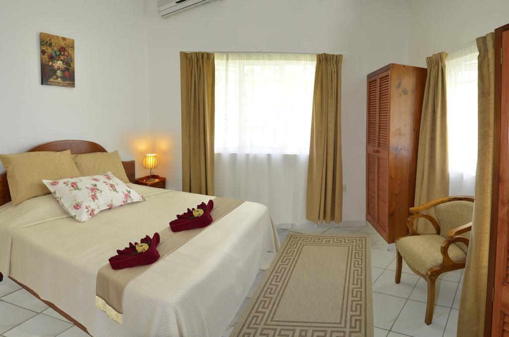 Ixora Villa Ансе-Рояль Номер фото