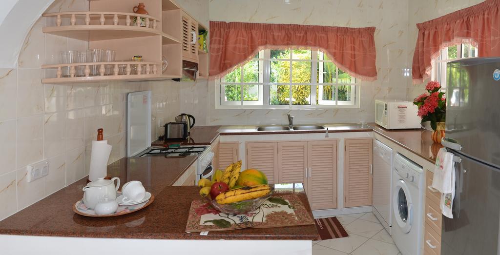 Ixora Villa Ансе-Рояль Номер фото